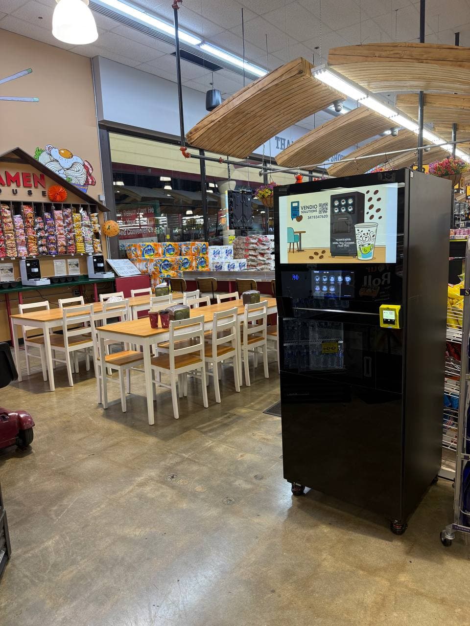Coffee vending machine in a grocery store food court